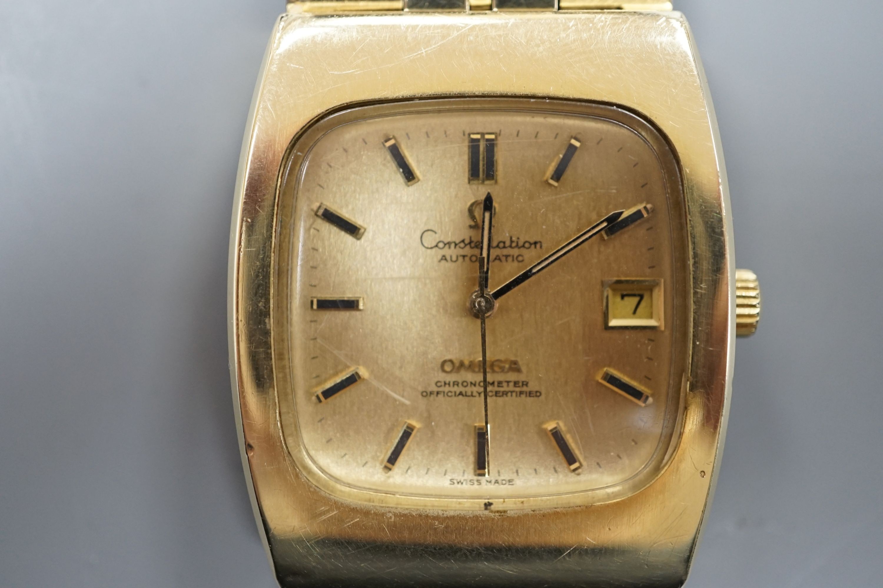 A gentleman's steel and gold plated Omega Constellation automatic wrist watch, on a steel and gold plated Omega bracelet, case diameter 34mm, no box or papers.
